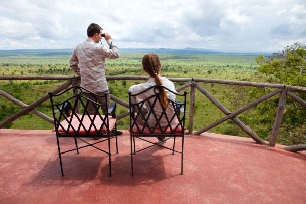 Tourists enjoy the view during the 4 days Tanzania private safari in Ngorongoro Crater